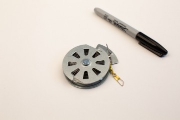 Wire trigger yoyo reel